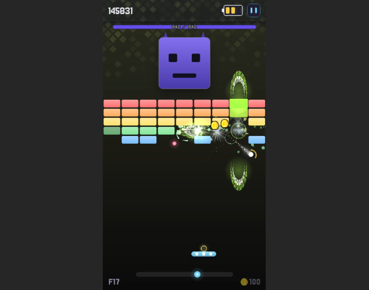 Floor 17 in play: a full grid of red, orange, green and blue bricks sits under a purple horned boss on 842 health, while two green portals bend the breaker’s path across the field.